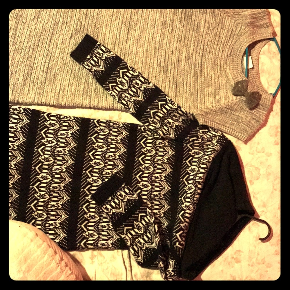 Two sweater dresses from crazy 8’s kids store.
